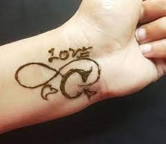 c letter mehndi design love hand